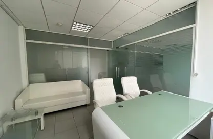 Office Space - Studio - 1 Bathroom for rent in Blue Tower - Sheikh Zayed Road - Dubai