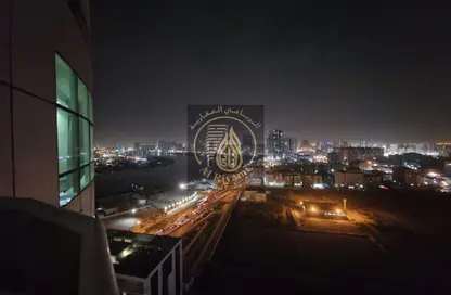 شقة - غرفة نوم - 2 حمامات للايجار في أورينت تاور 1 - أورينت تاور - البستان - عجمان