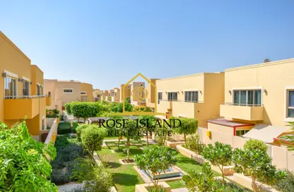 Outdoor Building image for: Townhouse - 4 Bedrooms - 5 Bathrooms for sale in Al Mariah Community - Al Raha Gardens - Abu Dhabi, Image 1