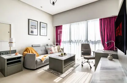 Living Room image for: Apartment - 1 Bedroom - 2 Bathrooms for rent in Bellevue Tower 2 - Bellevue Towers - Downtown Dubai - Dubai, Image 1