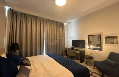 Room / Bedroom image for: Apartment - 1 Bathroom for sale in Golf Promenade 2B - Golf Promenade - DAMAC Hills - Dubai, Image 1
