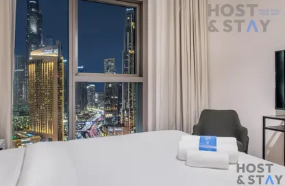 Room / Bedroom image for: Apartment - 3 Bedrooms - 4 Bathrooms for rent in Downtown Views II Tower 3 - Downtown Views II - Downtown Dubai - Dubai, Image 1
