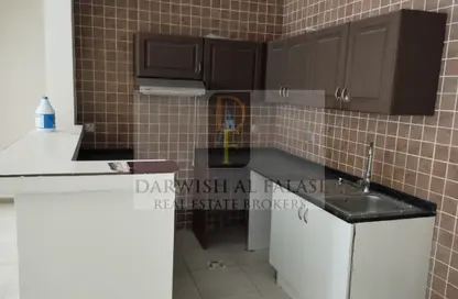 شقة - غرفة نوم - 2 حمامات للايجار في برج حمزة - مدينة دبي الرياضية - دبي