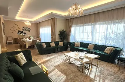 Villa - 4 Bedrooms - 5 Bathrooms for rent in Nad Al Sheba Villas - Nad Al Sheba 3 - Nad Al Sheba - Dubai