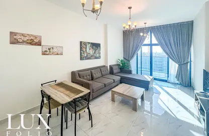 Living / Dining Room image for: Apartment - 1 Bedroom - 2 Bathrooms for sale in Sydney Tower - Jumeirah Village Circle - Dubai, Image 1