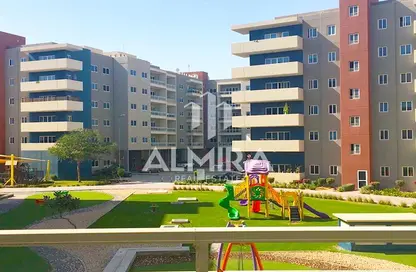 Outdoor Building image for: Apartment - 2 Bedrooms - 3 Bathrooms for sale in Tower 29 - Al Reef Downtown - Al Reef - Abu Dhabi, Image 1