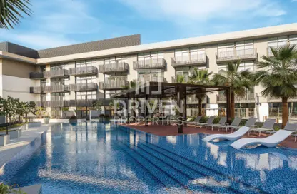 Pool image for: Apartment - 2 Bedrooms - 3 Bathrooms for sale in Oakley Square Residences - Jumeirah Village Circle - Dubai, Image 1