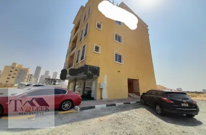 Outdoor Building image for: Whole Building - Studio for sale in Ajman Global City - Al Alia - Ajman, Image 1