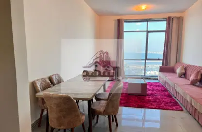 Living / Dining Room image for: Apartment - 1 Bedroom - 2 Bathrooms for rent in Sonya Tower - Sheikh Khalifa Bin Zayed Street - Ajman, Image 1