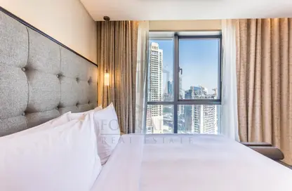 صورة لـ غرفة- غرفة النوم شقة - 1 حمام للايجار في فندق برج ليك - العنوان داون تاون - دبي وسط المدينة - دبي ، صورة رقم 1