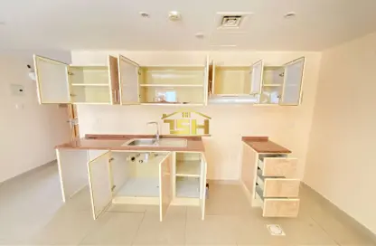 Kitchen image for: Apartment - 1 Bathroom for rent in Al Fajir Tower - Al Nahda - Sharjah, Image 1