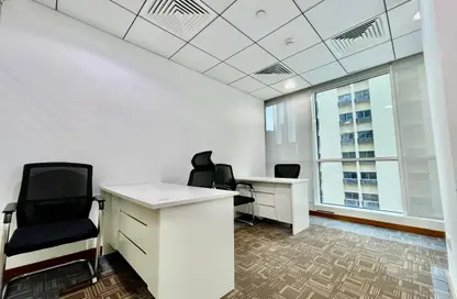 Office Space - Studio - 4 Bathrooms for rent in Hamdan Street - Abu Dhabi