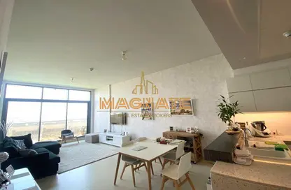 Living / Dining Room image for: Apartment - 2 Bedrooms - 3 Bathrooms for sale in Oia Residence - Motor City - Dubai, Image 1
