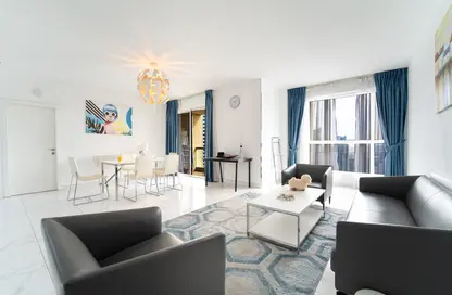 Living / Dining Room image for: Apartment - 4 Bedrooms - 5 Bathrooms for sale in Murjan 5 - Murjan - Jumeirah Beach Residence - Dubai, Image 1