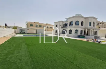 Villa - 7 Bedrooms - 7+ Bathrooms for sale in Khalifa City A - Khalifa City - Abu Dhabi