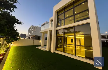 Outdoor House image for: Villa - 5 Bedrooms - 5 Bathrooms for rent in Trump Estates - DAMAC Hills - Dubai, Image 1
