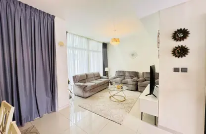 Living Room image for: Townhouse - 3 Bedrooms - 3 Bathrooms for sale in Aknan Villas - Vardon - Damac Hills 2 - Dubai, Image 1