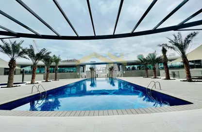 صورة لـ حوض سباحة شقة - 2 غرف نوم - 2 حمامات للايجار في أبراج سيجما - مدينة الأضواء - جزيرة الريم - أبوظبي ، صورة رقم 1