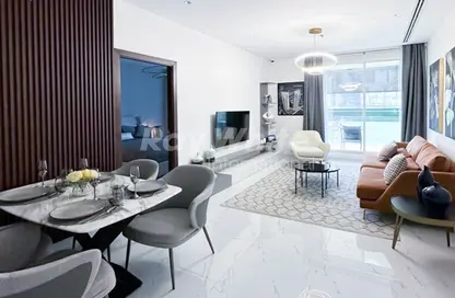 Living / Dining Room image for: Apartment - 1 Bedroom - 1 Bathroom for sale in Maimoon Gardens by Fakhruddin Properties - Jumeirah Village Circle - Dubai, Image 1
