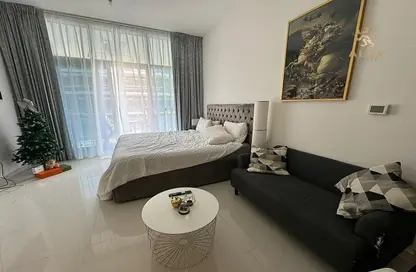 Room / Bedroom image for: Apartment - 1 Bedroom - 2 Bathrooms for sale in Golf Promenade 3B - Golf Promenade - DAMAC Hills - Dubai, Image 1