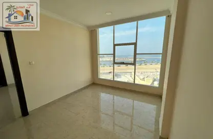 Apartment - 1 Bedroom - 1 Bathroom for rent in Corniche Tower - Ajman Corniche Road - Ajman