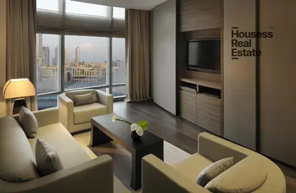 Living Room image for: Apartment - 1 Bedroom - 1 Bathroom for rent in Armani Residence - Burj Khalifa Area - Downtown Dubai - Dubai, Image 1