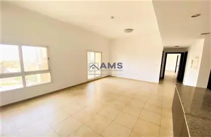 Empty Room image for: Apartment - 2 Bedrooms - 2 Bathrooms for sale in Al Thamam 26 - Al Thamam - Remraam - Dubai, Image 1