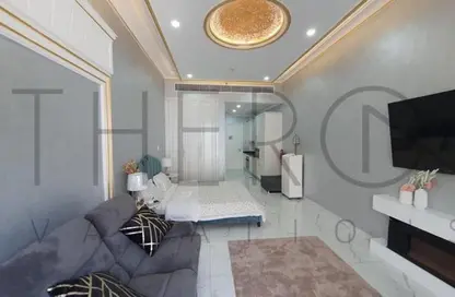 Living Room image for: Apartment - 1 Bathroom for rent in Vincitore Boulevard - Arjan - Dubai, Image 1