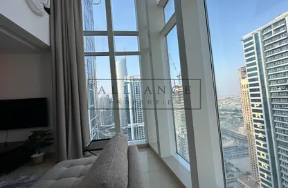 Living Room image for: Apartment - 1 Bedroom - 2 Bathrooms for sale in Laguna Tower - Lake Almas West - Jumeirah Lake Towers - Dubai, Image 1