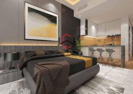 Room / Bedroom image for: Studio - 1 bathroom for sale in The V Tower - Dubai Residence Complex - Dubai, Image 1