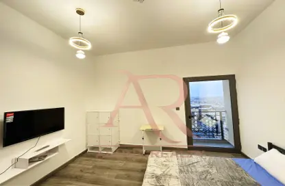 Living Room image for: Apartment - 1 Bathroom for sale in Silicon Gates 1 - Silicon Gates - Dubai Silicon Oasis - Dubai, Image 1