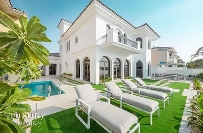 Outdoor House image for: Villa - 6 Bedrooms - 7 Bathrooms for rent in Garden Homes Frond E - Garden Homes - Palm Jumeirah - Dubai, Image 1
