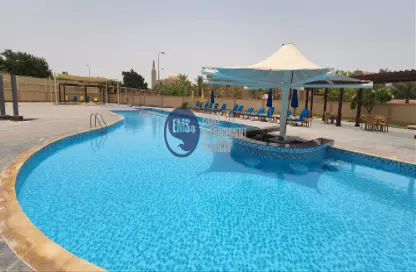 Villa - 4 Bedrooms - 6 Bathrooms for rent in Golf Gardens - Khalifa City - Abu Dhabi