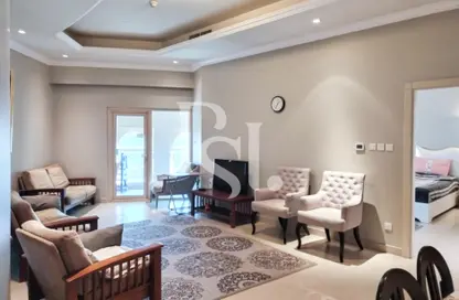 Living Room image for: Apartment - 2 Bedrooms - 3 Bathrooms for sale in Al Hamra Palace Beach Resort - Al Hamra Village - Ras Al Khaimah, Image 1
