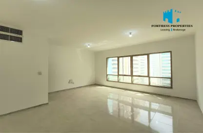 Apartment - 3 Bedrooms - 3 Bathrooms for rent in Alqubaisi Building - Tourist Club Area - Abu Dhabi