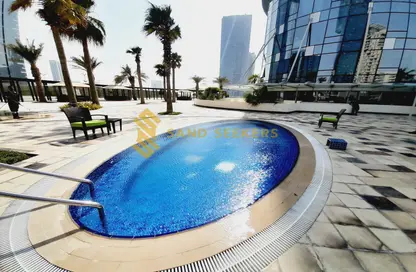 صورة لـ حوض سباحة شقة - 3 غرف نوم - 4 حمامات للايجار في صن تاور - شمس أبوظبي - جزيرة الريم - أبوظبي ، صورة رقم 1