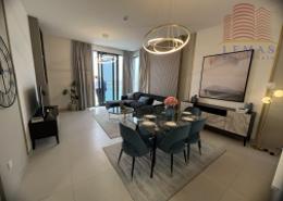 Living / Dining Room image for: Apartment - 1 bedroom - 2 bathrooms for sale in Sharjah Waterfront City - Sharjah, Image 1
