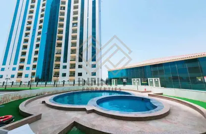 Apartment - 2 Bedrooms - 2 Bathrooms for sale in Orient Tower 1 - Orient Towers - Al Bustan - Ajman