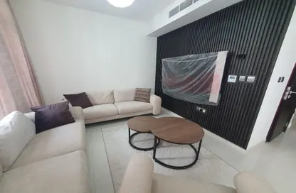 Living Room image for: Villa - 3 Bedrooms - 3 Bathrooms for rent in Albizia - Damac Hills 2 - Dubai, Image 1