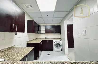 صورة لـ مطبخ شقة - غرفة نوم - 2 حمامات للبيع في نورا ريزيدنس 1 - نورا ريزيدنس - قرية الجميرا سركل - دبي ، صورة رقم 1