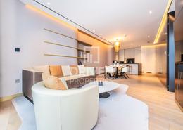 صورةغرفة المعيشة / غرفة الطعام لـ: شقة - 1 غرفة نوم - 2 حمامات للبيع في برج أوبوس - الخليج التجاري - دبي, صورة 1