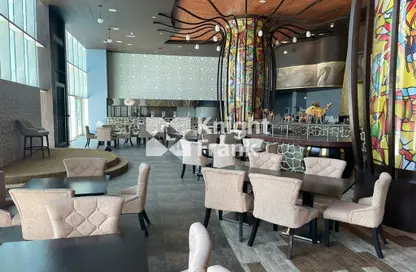 Living / Dining Room image for: Retail - Studio for rent in Sultan Bin Zayed the First Street - Muroor Area - Abu Dhabi, Image 1