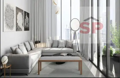 Living Room image for: Apartment - 2 Bedrooms - 3 Bathrooms for sale in Tiraz - Naseej District - Aljada - Sharjah, Image 1