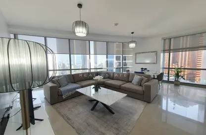 Living Room image for: Apartment - 1 Bedroom - 2 Bathrooms for rent in Etihad Tower 2 - Etihad Towers - Corniche Road - Abu Dhabi, Image 1