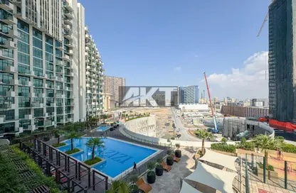 Pool image for: Apartment - 1 Bathroom for sale in Farhad Azizi Residence - Al Jaddaf - Dubai, Image 1