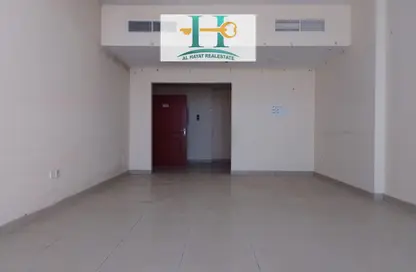 Empty Room image for: Apartment - 2 Bedrooms - 2 Bathrooms for rent in Orient Tower 1 - Orient Towers - Al Bustan - Ajman, Image 1
