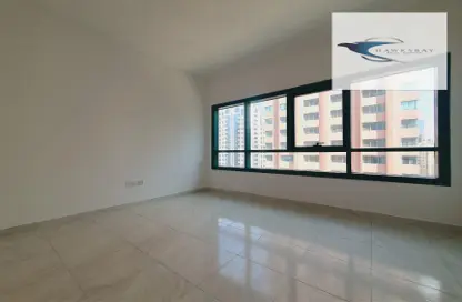 Apartment - 2 Bedrooms - 2 Bathrooms for rent in Zig Zag Building - Tourist Club Area - Abu Dhabi