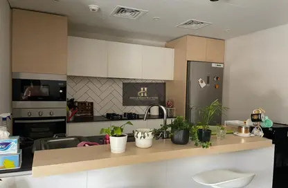 صورة لـ مطبخ شقة - 2 غرف نوم - 4 حمامات للبيع في 2 بلجرافيا - بلجرافيا - قرية الجميرا سركل - دبي ، صورة رقم 1