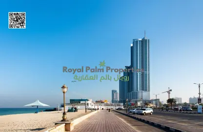 Apartment - 2 Bedrooms - 2 Bathrooms for sale in Corniche Tower - Ajman Corniche Road - Ajman