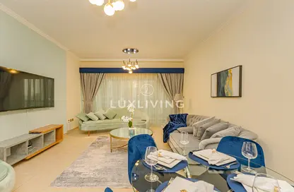 Living Room image for: Apartment - 1 Bedroom - 2 Bathrooms for rent in Burj Al Nujoom - Downtown Dubai - Dubai, Image 1
